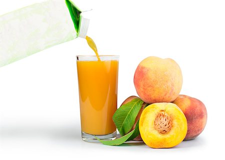 Peaches and glass with juice white isolated studio shot. Stock Photo - Budget Royalty-Free & Subscription, Code: 400-07210131