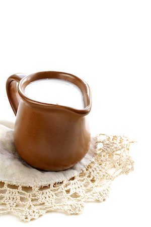 simsearch:400-08262916,k - ceramic brown  jug full of milk, rustic style Photographie de stock - Aubaine LD & Abonnement, Code: 400-07210448