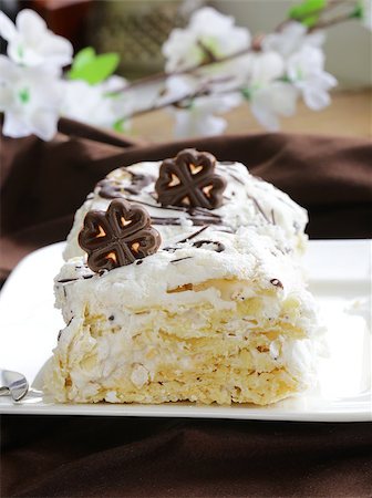 puff - white layer cake with custard (Napoleon) decorated with chocolate Stock Photo - Budget Royalty-Free & Subscription, Code: 400-07210456