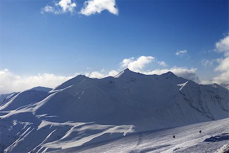 simsearch:400-06518902,k - View on ski slope and beautiful mountains in evening. Ski resort Gudauri. Caucasus Mountains, Georgia. Stock Photo - Budget Royalty-Free & Subscription, Code: 400-07211114