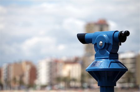 spyglass - A coin operated Telescope for viewing a city of skyscapers Photographie de stock - Aubaine LD & Abonnement, Code: 400-07211411