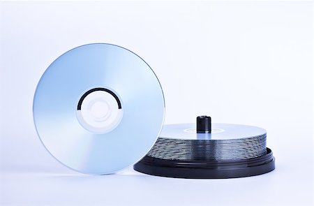 simsearch:695-05768053,k - stack of printable discs on grey background Photographie de stock - Aubaine LD & Abonnement, Code: 400-07211523