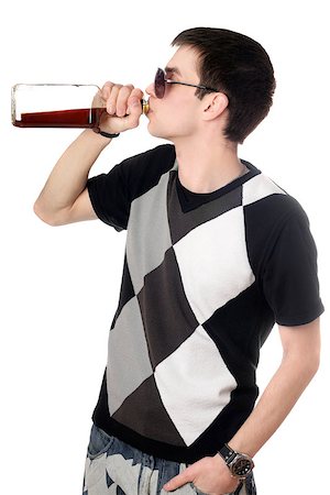Young man with a bottle of whiskey Stock Photo - Budget Royalty-Free & Subscription, Code: 400-07211561