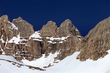 simsearch:400-03921772,k - Rocks in snow and blue cloudless sky. Turkey, Central Taurus Mountains, Aladaglar (Anti-Taurus), view from plateau Edigel (Yedi Goller) Foto de stock - Super Valor sin royalties y Suscripción, Código: 400-07211847