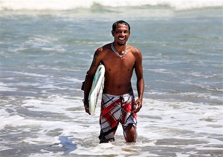simsearch:400-04108589,k - Man-surfer with board on a coastline. Bali. Indonesia Foto de stock - Super Valor sin royalties y Suscripción, Código: 400-07212724