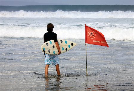 simsearch:400-07212727,k - Surfer on a coastline expecting the big wave. Bali Stock Photo - Budget Royalty-Free & Subscription, Code: 400-07212720