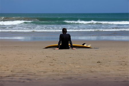 simsearch:400-07212727,k - Surfer on a coastline expecting the big wave. Bali Stock Photo - Budget Royalty-Free & Subscription, Code: 400-07212721
