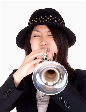 Portrait of a Female Trumpet Player - Isolated on White Stock Photo - Budget Royalty-Free & Subscription, Code: 400-07213717