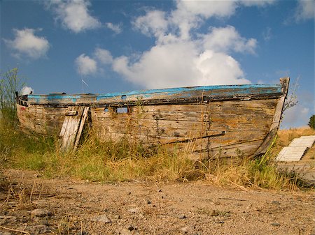 Old nautical vessel - abandoned on the dry land Stock Photo - Budget Royalty-Free & Subscription, Code: 400-07224162