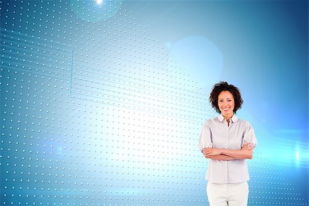 simsearch:400-07345820,k - Composite image of portrait of businesswoman with crossed arms smiling at the camera Stock Photo - Budget Royalty-Free & Subscription, Code: 400-07224557