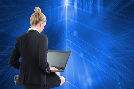 simsearch:400-07188518,k - Composite image of blonde businesswoman using laptop Foto de stock - Royalty-Free Super Valor e Assinatura, Número: 400-07225244