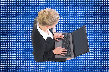 simsearch:400-07188518,k - Composite image of blonde businesswoman using laptop Foto de stock - Royalty-Free Super Valor e Assinatura, Número: 400-07225346