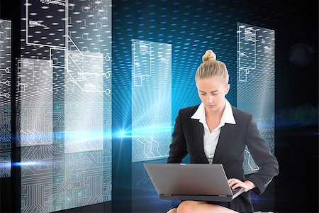 simsearch:400-07188518,k - Composite image of blonde businesswoman using laptop Foto de stock - Royalty-Free Super Valor e Assinatura, Número: 400-07225439