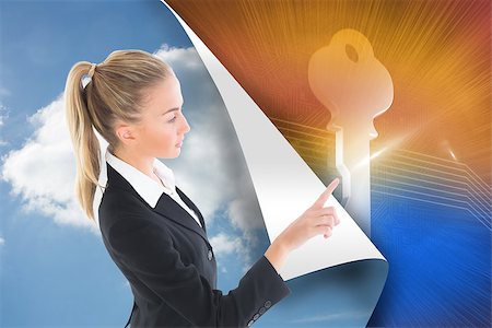 simsearch:400-07227450,k - Composite image of blonde businesswoman pointing somewhere Stock Photo - Budget Royalty-Free & Subscription, Code: 400-07225507