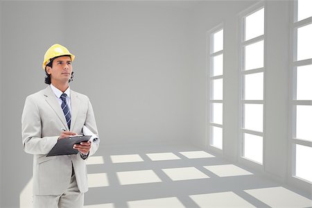 simsearch:400-08020381,k - Composite image of attractive architect taking notes Fotografie stock - Microstock e Abbonamento, Codice: 400-07225554