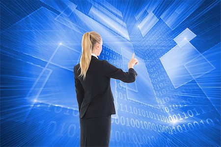 simsearch:400-07224720,k - Composite image of blonde businesswoman pointing somewhere Stock Photo - Budget Royalty-Free & Subscription, Code: 400-07225834