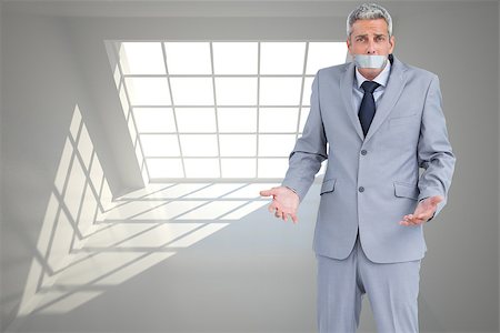 Composite image of businessman gagged with adhesive tape on mouth Stock Photo - Budget Royalty-Free & Subscription, Code: 400-07225913