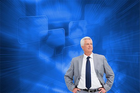 simsearch:400-07225597,k - Composite image of man in a suit with his hands on his hips Stock Photo - Budget Royalty-Free & Subscription, Code: 400-07226041