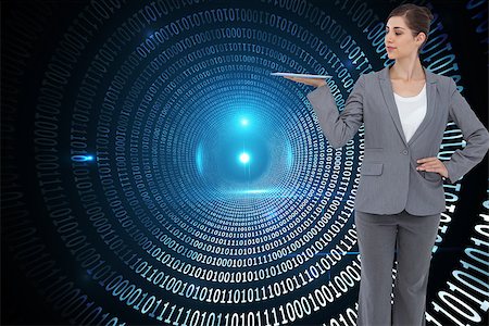 simsearch:400-07224720,k - Composite image of businesswoman holding tablet computer Stock Photo - Budget Royalty-Free & Subscription, Code: 400-07226241