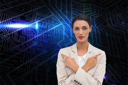 simsearch:400-07345820,k - Composite image of charismatic businesswoman with her arms crossed and fingers pointing Stock Photo - Budget Royalty-Free & Subscription, Code: 400-07226281