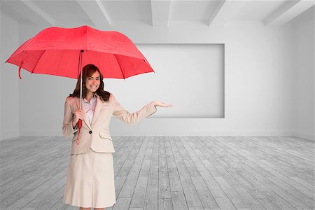 Composite image of happy brunette businesswoman holding umbrella Photographie de stock - Aubaine LD & Abonnement, Code: 400-07226327