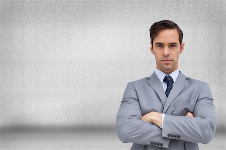 simsearch:400-07275251,k - Composite image of young businessman looking at camera Stock Photo - Budget Royalty-Free & Subscription, Code: 400-07226405