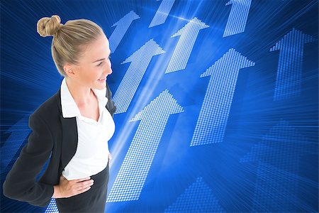 simsearch:400-07258010,k - Composite image of blonde businesswoman standing with hands on hips Foto de stock - Royalty-Free Super Valor e Assinatura, Número: 400-07226569