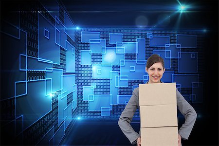 Composite image of smiling businesswoman carrying cardboard boxes Stock Photo - Budget Royalty-Free & Subscription, Code: 400-07226637