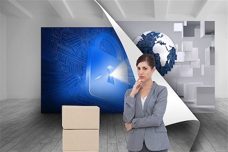 security screen - Composite image of thoughtful businesswoman posing with cardboard boxes Stock Photo - Budget Royalty-Free & Subscription, Code: 400-07226663