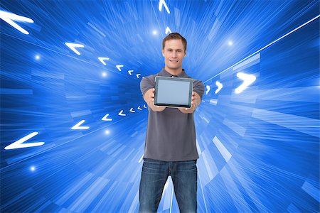 people tablet digital light - Composite image of young man showing screen of his tablet computer Stock Photo - Budget Royalty-Free & Subscription, Code: 400-07226720