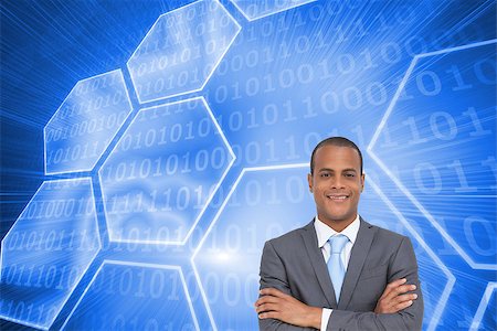 simsearch:400-07345820,k - Composite image of charismatic young businessman with arms crossed Stock Photo - Budget Royalty-Free & Subscription, Code: 400-07226791