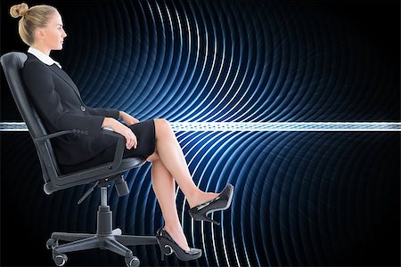 simsearch:400-07224720,k - Composite image of blonde businesswoman sitting on swivel chair in black suit Stock Photo - Budget Royalty-Free & Subscription, Code: 400-07226945