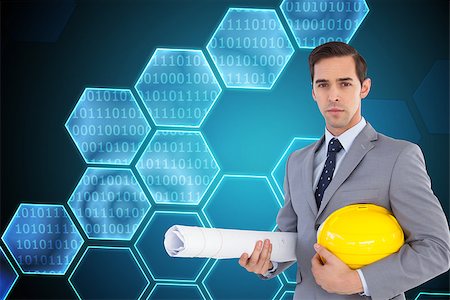 single geometric shape - Composite image of serious architect holding plans and hard hat Stock Photo - Budget Royalty-Free & Subscription, Code: 400-07226993