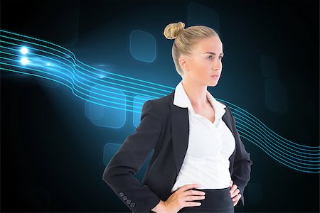 simsearch:400-07224720,k - Composite image of blonde businesswoman standing with hands on hips Stock Photo - Budget Royalty-Free & Subscription, Code: 400-07227075
