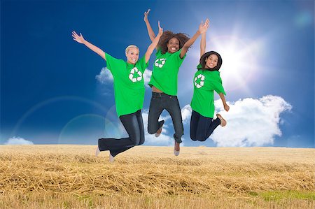 simsearch:400-07664794,k - Composite image of three enviromental activists jumping and smiling Stock Photo - Budget Royalty-Free & Subscription, Code: 400-07227072