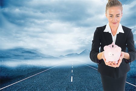 simsearch:400-07220030,k - Composite image of blonde businesswoman holding pink piggy bank Stock Photo - Budget Royalty-Free & Subscription, Code: 400-07227384