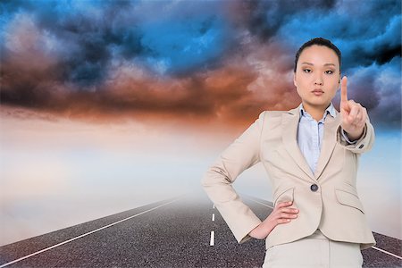 simsearch:400-07183573,k - Composite image of unsmiling asian businesswoman pointing Stock Photo - Budget Royalty-Free & Subscription, Code: 400-07227769