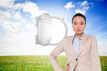 Composite image of unsmiling asian businesswoman pointing Stock Photo - Budget Royalty-Free & Subscription, Code: 400-07227829