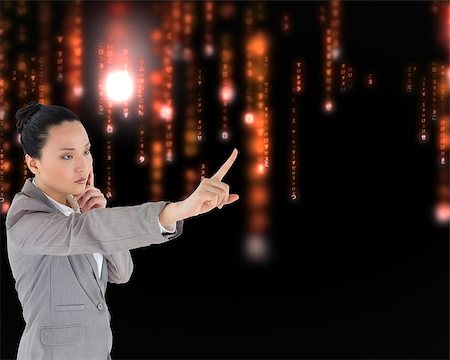 Composite image of unsmiling thinking asian businesswoman pointing Photographie de stock - Aubaine LD & Abonnement, Code: 400-07220455