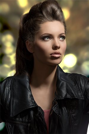 close-up fashion portrait of sensual young girl with brown rock hair-style wearing modern  clothes, black leather jacket Stock Photo - Budget Royalty-Free & Subscription, Code: 400-07221271