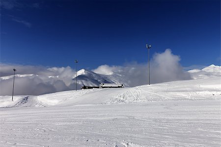 simsearch:400-08780271,k - Ski slope and hotel in winter mountains. Georgia, ski resort Gudauri. Caucasus Mountains. Wide angle view. Photographie de stock - Aubaine LD & Abonnement, Code: 400-07221318