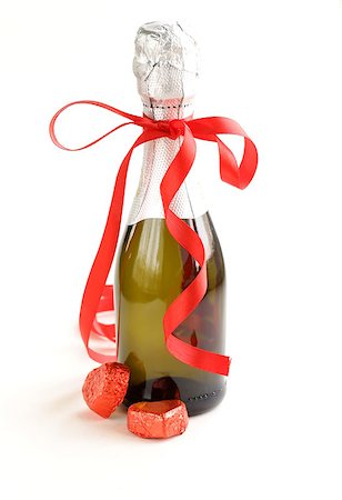 Festive bottle of champagne on a white background Stock Photo - Budget Royalty-Free & Subscription, Code: 400-07221579