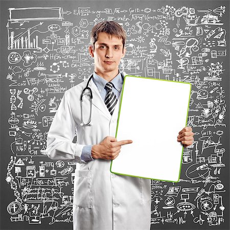 simsearch:400-07216659,k - Doctor man with write board in his hands Photographie de stock - Aubaine LD & Abonnement, Code: 400-07222176