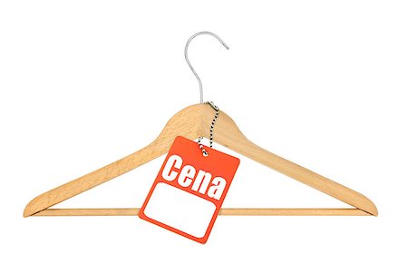 simsearch:400-05333011,k - Coat hanger and polish price tag isolated on white background Photographie de stock - Aubaine LD & Abonnement, Code: 400-07222312