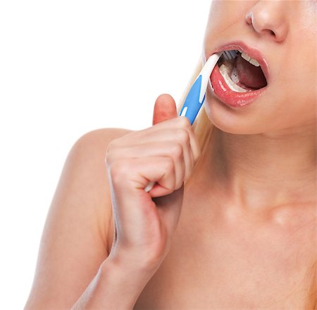 Closeup on teenage girl brushing teeth Stock Photo - Budget Royalty-Free & Subscription, Code: 400-07222539