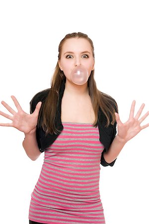 simsearch:400-08336541,k - Young woman blowing a bubble from chewing gum Photographie de stock - Aubaine LD & Abonnement, Code: 400-07223185