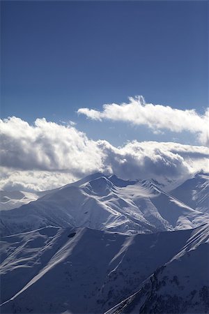 simsearch:400-07211845,k - Snowy mountains at evening. View from ski resort Gudauri. Caucasus Mountains, Georgia. Stockbilder - Microstock & Abonnement, Bildnummer: 400-07223271