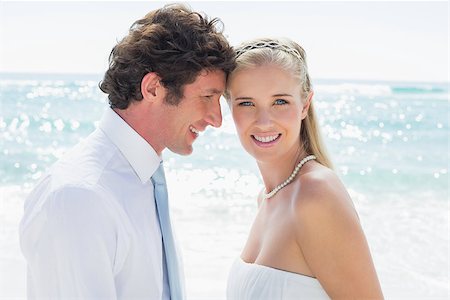 simsearch:400-07664797,k - Happy couple on their wedding day at the beach Stock Photo - Budget Royalty-Free & Subscription, Code: 400-07231509
