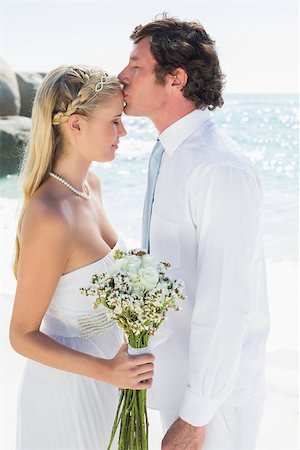 simsearch:400-07664797,k - Affectionate couple on their wedding day at the beach Stock Photo - Budget Royalty-Free & Subscription, Code: 400-07231510