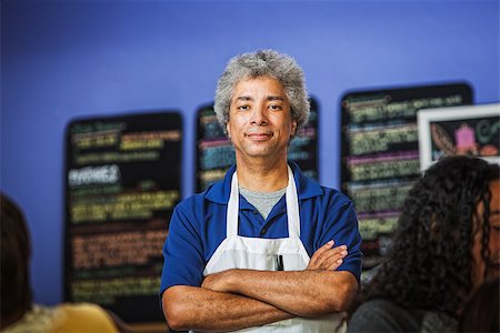 simsearch:400-07042113,k - Confident African coffee house owner with folded arms Stock Photo - Budget Royalty-Free & Subscription, Code: 400-07244047